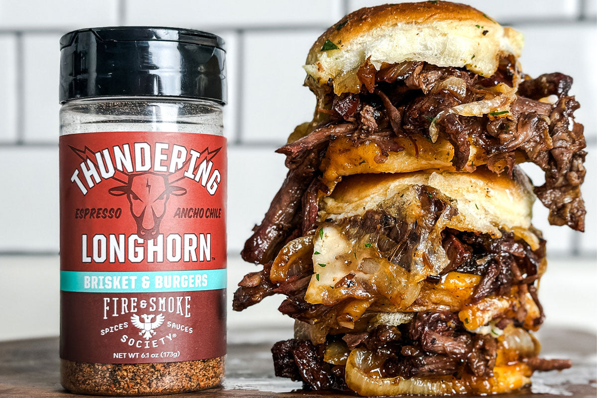 https://fireandsmokesociety.com/cdn/shop/articles/Pulled-Beef-and-Cheese-Sliders-with-Thundering-Longhorn-Seasoning.jpg?v=1695055881