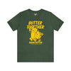 A green crew neck t-shirt with the text 'BUTTER TOGETHER' and an illustration of a smiling stick of butter walking beside an onion on it.