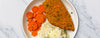 breaded garlic and herb chicken with carrots and mashed potatoes