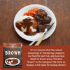 A plated Sunday dinner with roast, mashed potatoes covered in brown gravy, carrots, and a fork and knife on a wooden table. A package Big Sunday Brown Gravy Mix is shown in the lower left, with a text banner on the right describing the product.