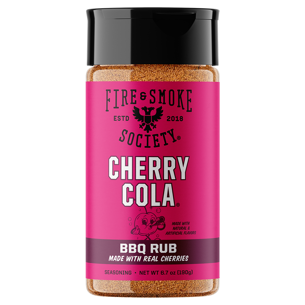 A bottle of Fire & Smoke Society Cherry Cola BBQ Rub seasoning, featuring a bright pink label with a black cap, set against a plain white background.