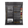 Back of a black packaged food product on a white background, showing nutrition facts, shopping list, directions, ingredient icons, and a barcode.