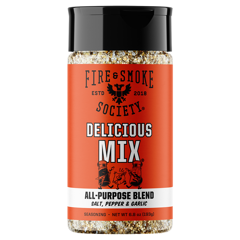 A bottle of Fire & Smoke Society Delicious Mix All-Purpose Blend seasoning, featuring a bright orange label and a black cap, set against a plain white background.