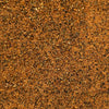 A close-up texture shot of a Garlic & Herb chicken blend seasoning