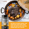 Bottle of the spice Holy Garlic by a Pot Roast
