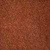 A close-up texture shot of a fine, granular spices