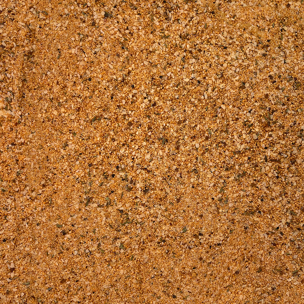 A bottle of Fire & Smoke Society Honey Garlic BBQ Rub seasoning, featuring a bright yellow-orange label with black and white text, a black cap, and visible brown seasoning inside, set against a plain white background.