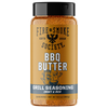 A bottle of Fire & Smoke Society BBQ Butter Grill Seasoning, featuring a golden-brown label, black cap, and visible orange-brown seasoning inside, set against a plain white background.