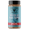 A bottle of Fire & Smoke Society BBQ Rub seasoning, featuring a light blue label with a black cap and a red band at the bottom. The label reads 'Mayor of Rub Town' and 'BBQ Rub Smokey Brown Sugar'.