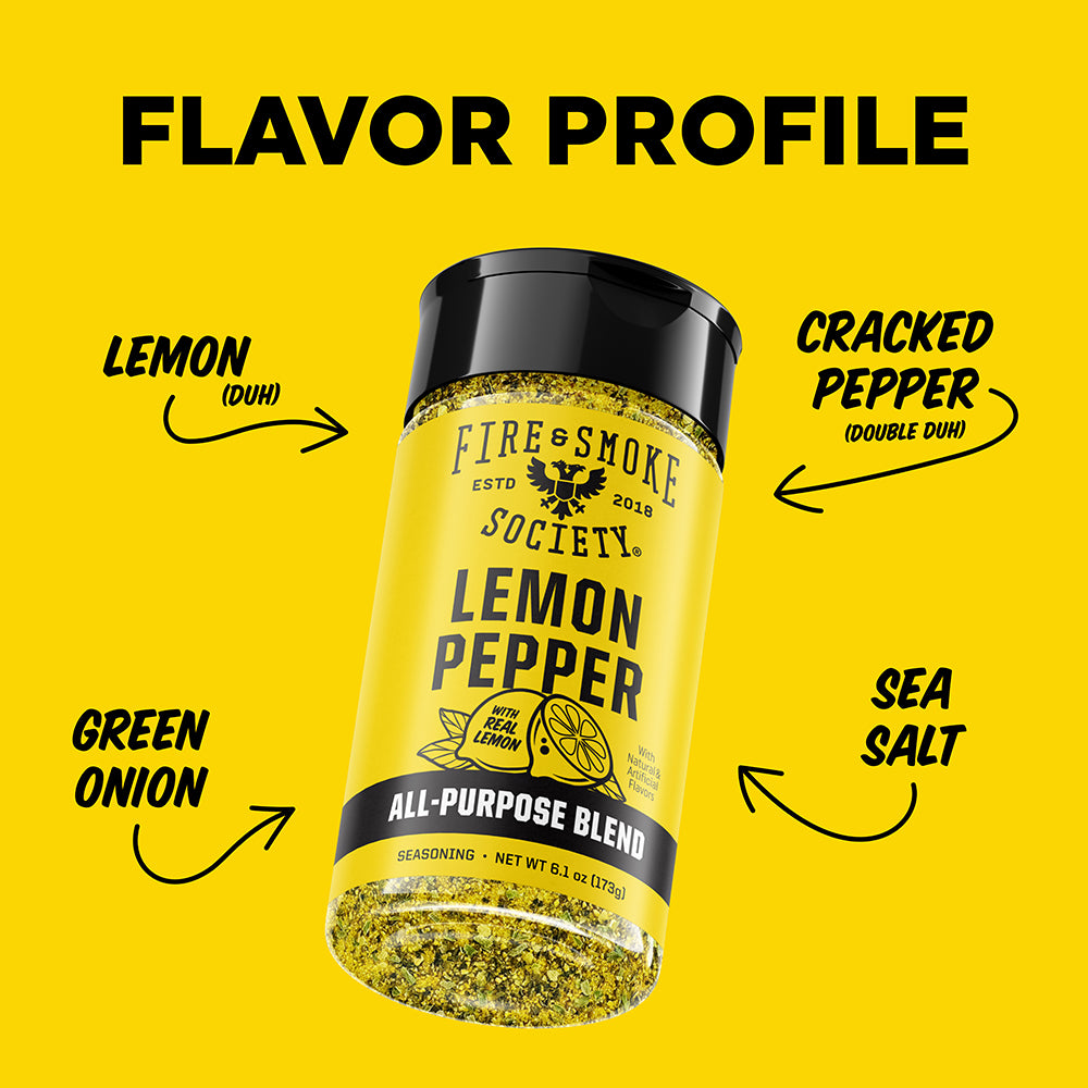 A bottle of Fire Smoke Society Lemon Pepper seasoning centered on a bright yellow background with callout arrows and text listing flavor notes: Lemon, Cracked Pepper, Green Onion, and Sea Salt.