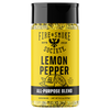 A bottle of Fire & Smoke Society Lemon Pepper seasoning with a bright yellow label, black cap, and visible golden peppercorns inside, on a plain white background.