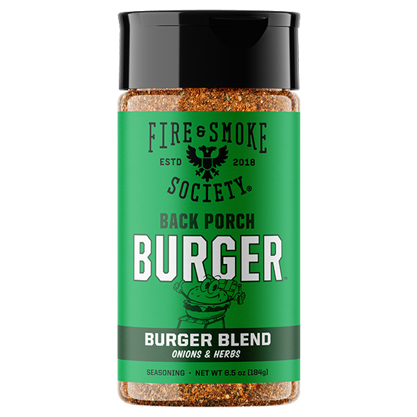 A bottle of Fire & Smoke Society Back Porch Burger Blend seasoning on a plain white background. The product features a bright green label with white and black text, a black cap, and visible brown spice seasoning inside the clear bottle.