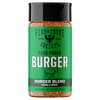 A bottle of Fire & Smoke Society Back Porch Burger Blend seasoning on a plain white background. The product features a bright green label with white and black text, a black cap, and visible brown spice seasoning inside the clear bottle.