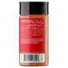 A bottle of Fat Granny's cajun seasoning shown from the back, featuring a red nutrition facts label and a black cap