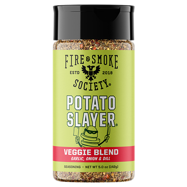 A bottle of Fire & Smoke Society Potato Slayer Veggie Blend seasoning, featuring a bright lime green label with a black cap, on a solid white background.