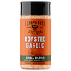 A bottle of Fire & Smoke Society Roasted Garlic Grill Blend seasoning, featuring an orange label with a black cap