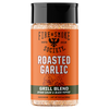 A bottle of Fire & Smoke Society Roasted Garlic Grill Blend seasoning, featuring an orange label with a black cap and showing the seasoning granules through the clear plastic bottle.