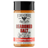 A bottle of Fire & Smoke Society Seasoned Salt All-Purpose Blend seasoning, featuring a white label with black and red text and a black cap, set against a plain white background.