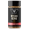 A bottle of Fire & Smoke Society Steak King Chopsouse Blend seasoning on a plain white background.