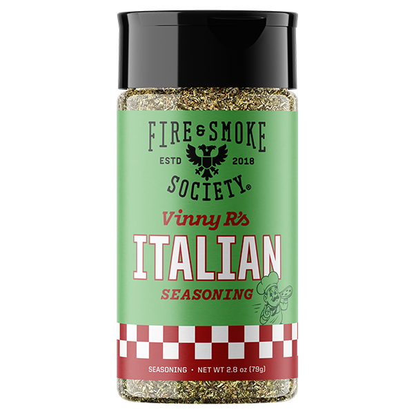 A bottle of Fire & Smoke Society Vinny's Italian Seasoning on a plain white background. The product features a light green label with a red and white checkered pattern at the bottom, a black cap, and visible seasoning inside the clear bottle.