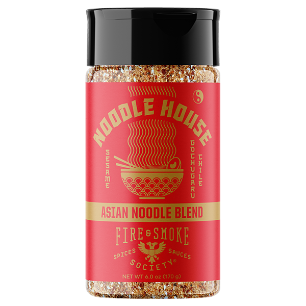 A bottle of Noodle House Asian Noodle Blend Fire & Smoke spices, featuring a red label with gold lettering and a black cap