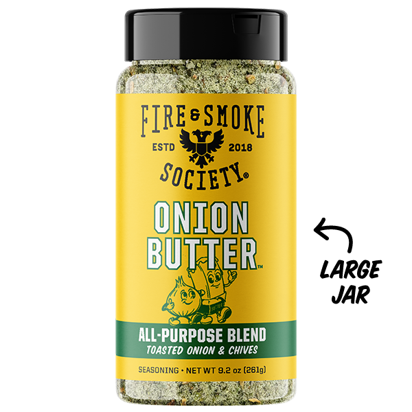 A bottle of Fire & Smoke Society Onion Butter seasoning on a white background, featuring a yellow label with a black cap and a 'LARGE JAR' callout graphic on the right.