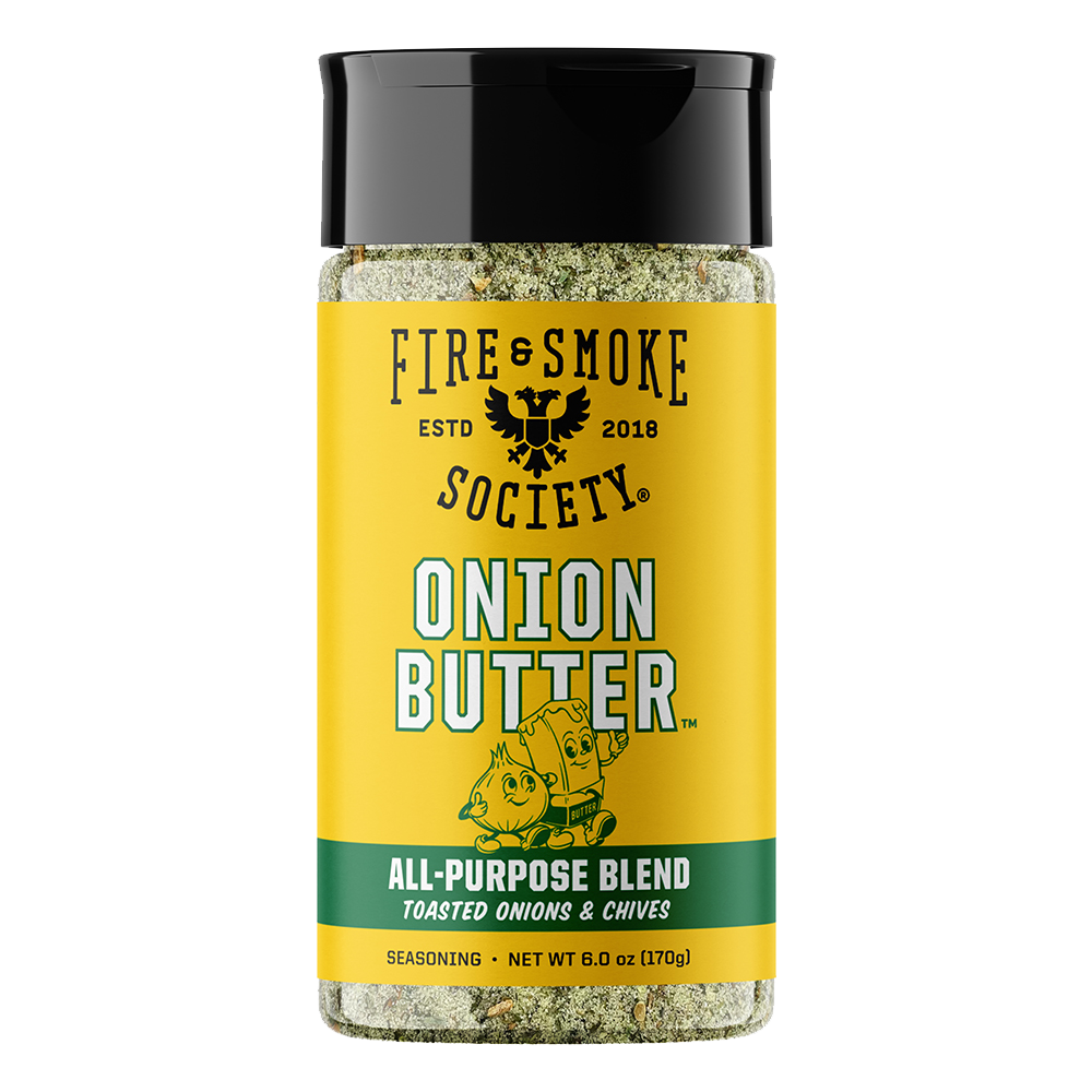 A bottle of Fire & Smoke Society Onion Butter seasoning, featuring a bright yellow label with black and white text, a green band at the bottom, and a black cap, shown on a white background.