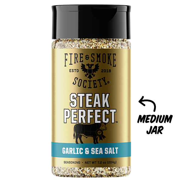 Seasoning jar labeled 'Steak Perfect' with garlic and sea salt on a white background