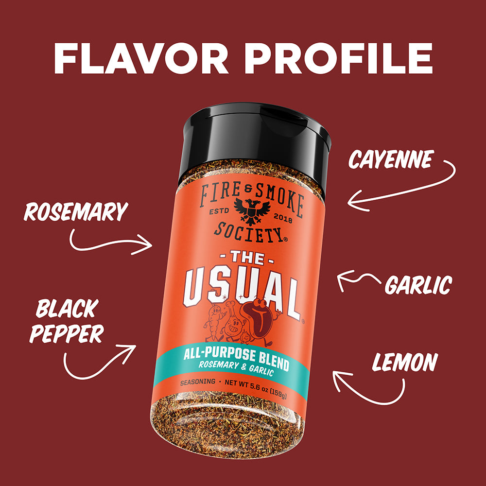 A seasoning bottle labeled Fire & Smoke Society 'The Usual' surrounded by white text callouts reading Rosemary, Cayenne, Garlic, Lemon, and Black Pepper on a dark red background, with the headline 'FLAVOR PROFILE' above.
