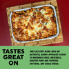 Baked pasta dish on a wooden board with text about salt-free blend ingredients.