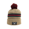 A Fire & Smoke Society beige knitted beanie with red and green stripes and a red pom pom on top